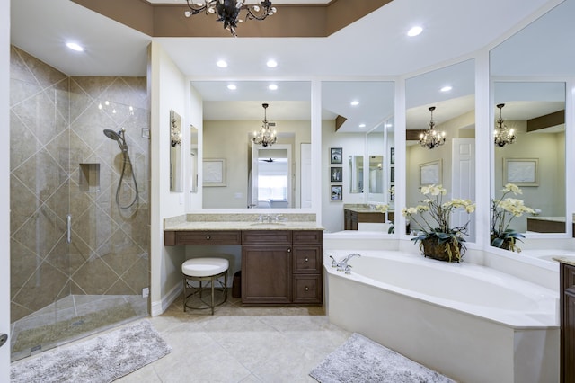 full bath featuring recessed lighting, a garden tub, a chandelier, and a shower stall