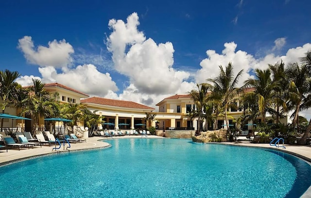 community pool with a patio