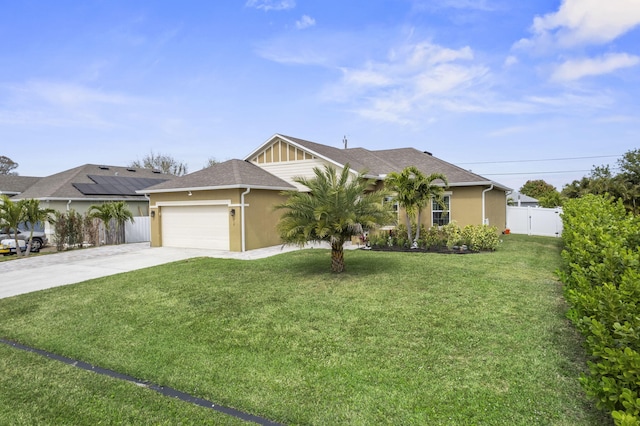 view of front facade featuring driveway, a front lawn, an attached garage, and stucco siding