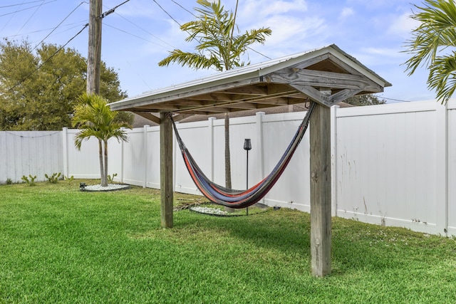 view of yard with a fenced backyard