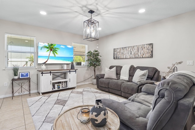 living room with recessed lighting, light tile patterned flooring, and baseboards