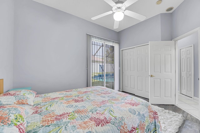 bedroom featuring a ceiling fan and wood finished floors