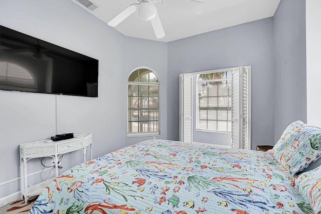 bedroom featuring ceiling fan and visible vents