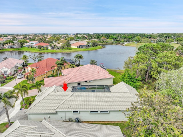 aerial view featuring a residential view and a water view