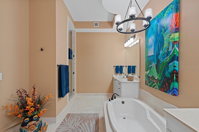 full bathroom featuring a chandelier, visible vents, vanity, baseboards, and a bath