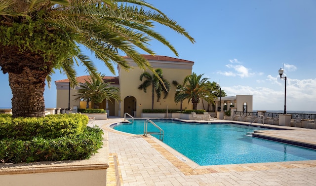 pool with a patio