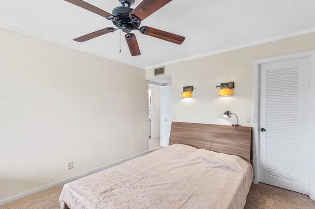 bedroom with a ceiling fan, baseboards, visible vents, light carpet, and crown molding