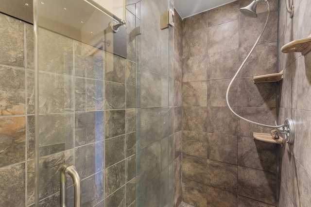 details with a tile shower