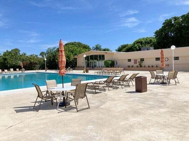 community pool featuring a patio area