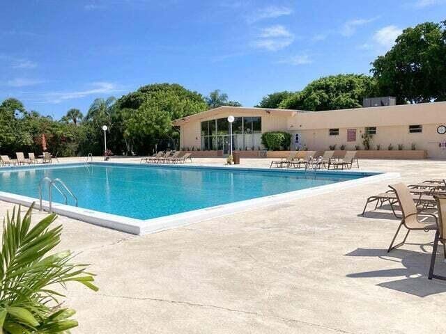 community pool with a patio