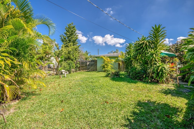 view of yard with fence