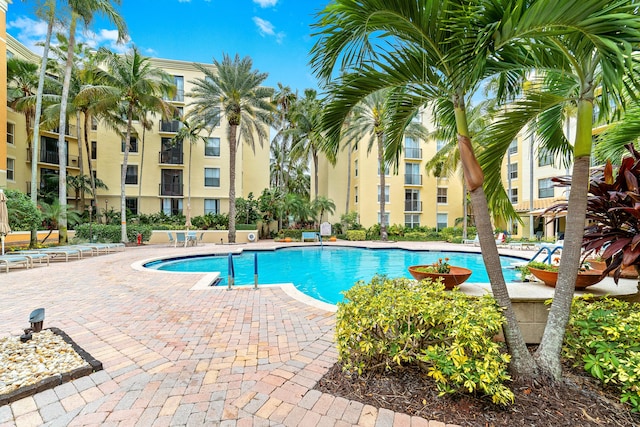 pool with a patio