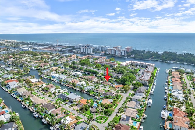 bird's eye view with a water view and a residential view