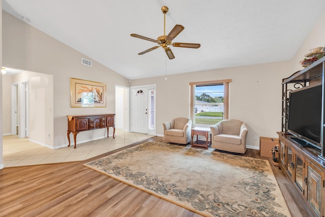 interior space with ceiling fan, wood finished floors, visible vents, and baseboards