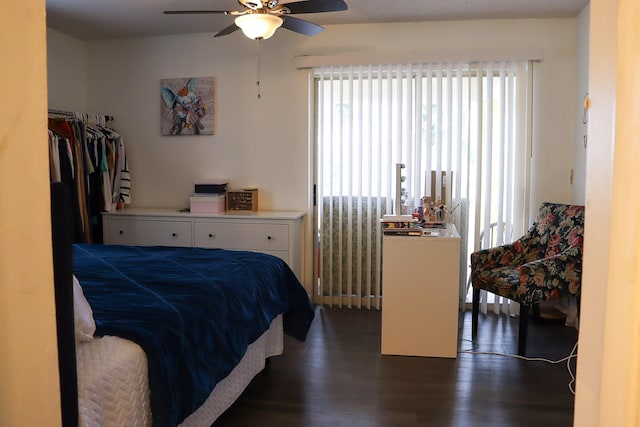 bedroom with wood finished floors