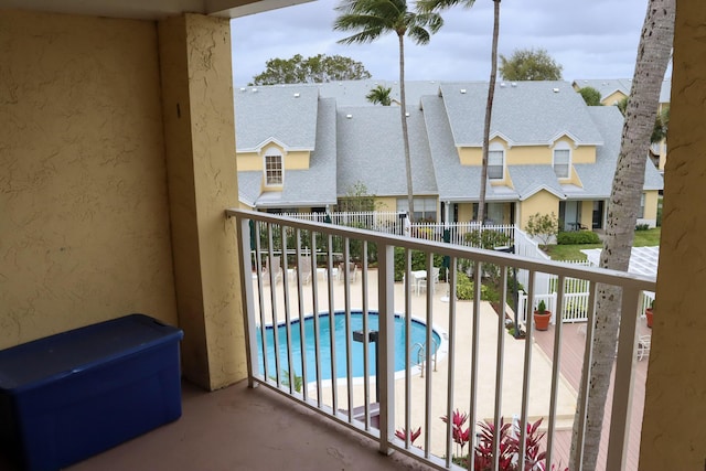 balcony featuring a residential view