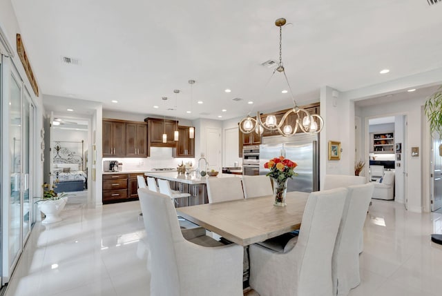 dining room with recessed lighting, visible vents, and light tile patterned flooring