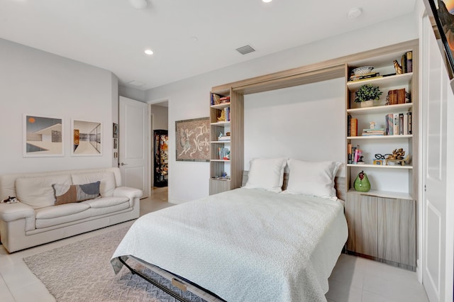 bedroom with recessed lighting, visible vents, and light tile patterned floors