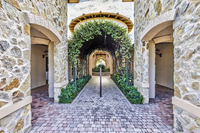 exterior space with stone siding