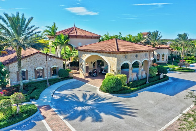 exterior space with concrete driveway