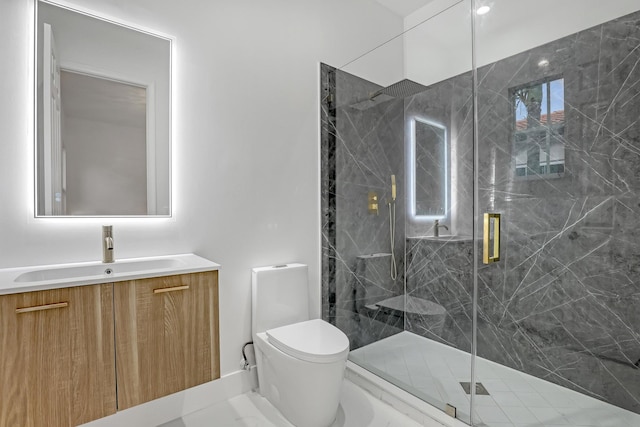 full bath featuring toilet, a marble finish shower, and vanity