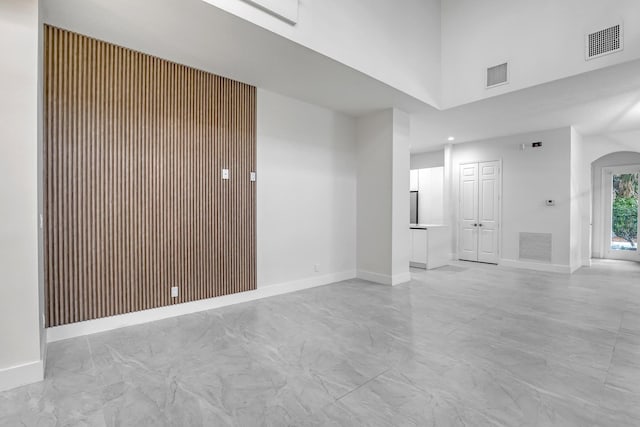 spare room with visible vents and baseboards