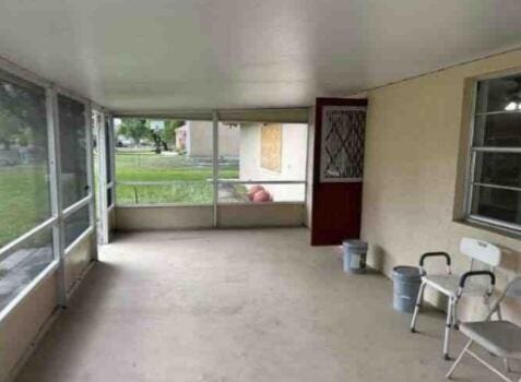 view of unfurnished sunroom