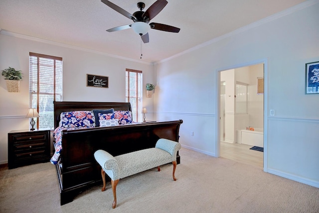 bedroom with carpet, multiple windows, crown molding, and ensuite bathroom