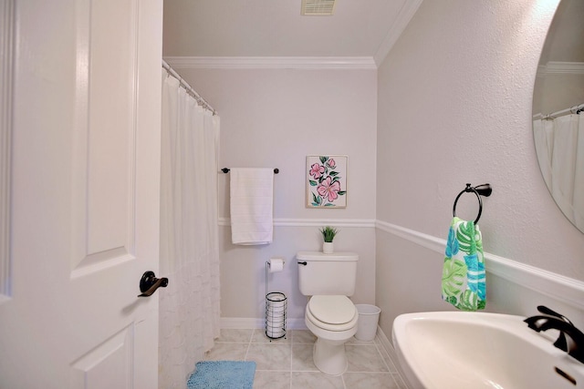 full bath with crown molding, visible vents, toilet, a sink, and tile patterned floors