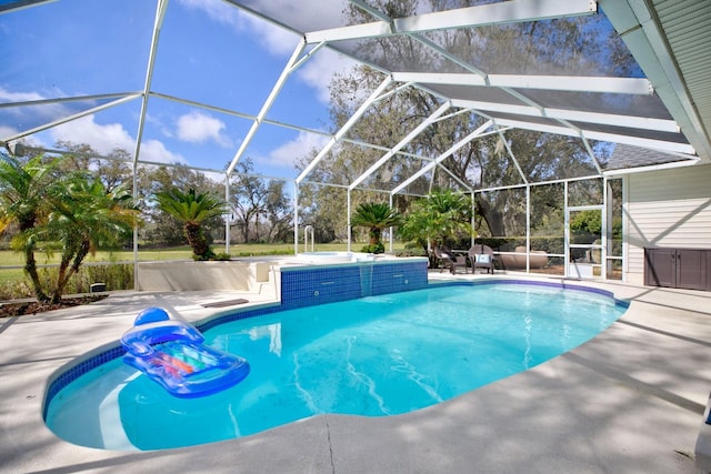 outdoor pool with a patio area and glass enclosure