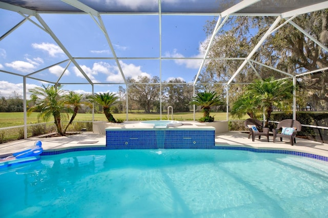 outdoor pool featuring a lanai and a patio area