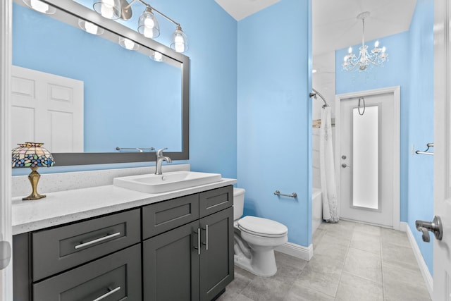 full bathroom with toilet, shower / bath combo, an inviting chandelier, tile patterned floors, and vanity