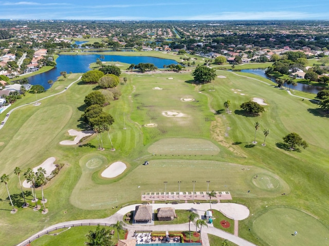 drone / aerial view featuring a water view and view of golf course