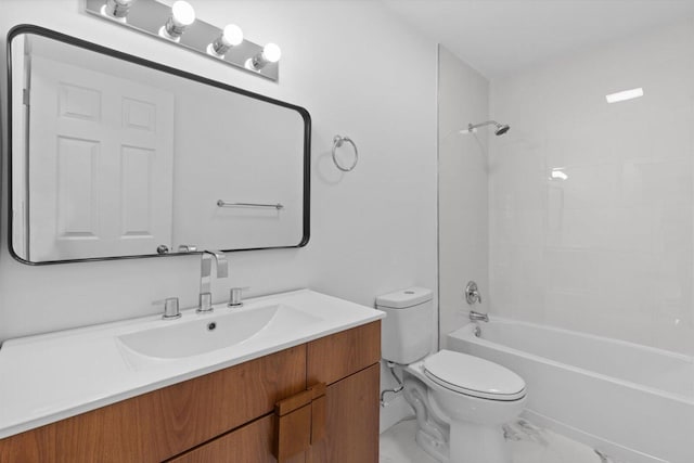 bathroom with marble finish floor, shower / bathing tub combination, vanity, and toilet