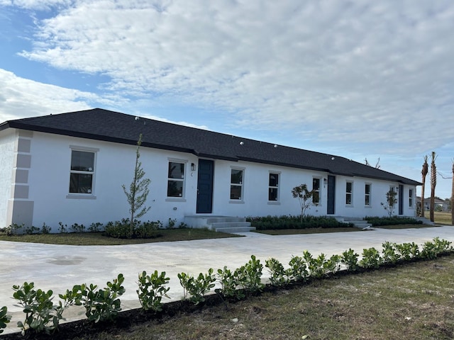 view of front of property featuring stucco siding