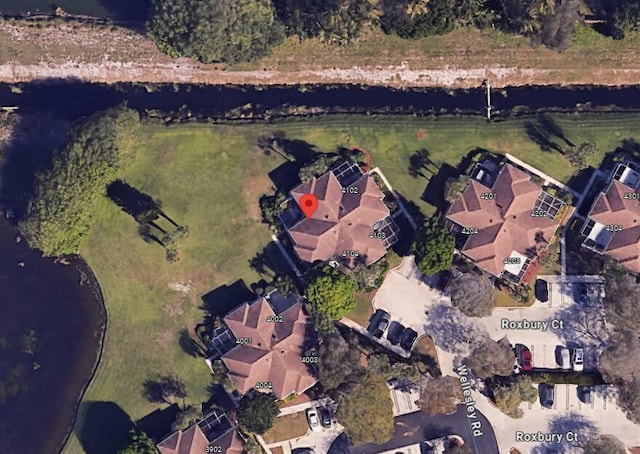 birds eye view of property with a residential view