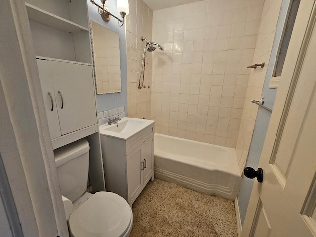 full bath featuring toilet, washtub / shower combination, speckled floor, and vanity