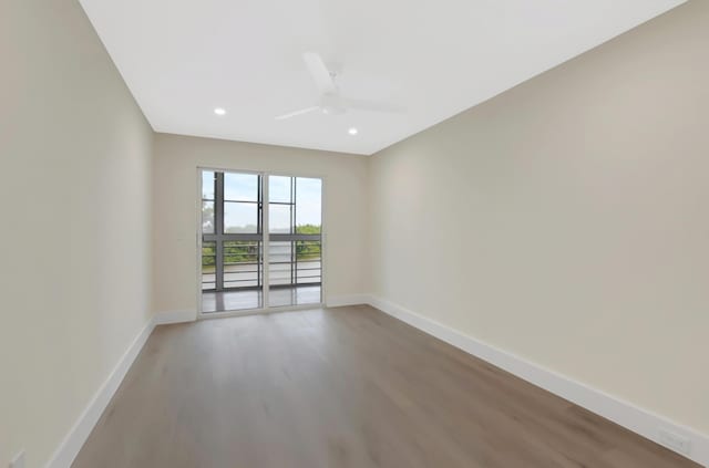 empty room with recessed lighting, baseboards, light wood-style floors, and ceiling fan