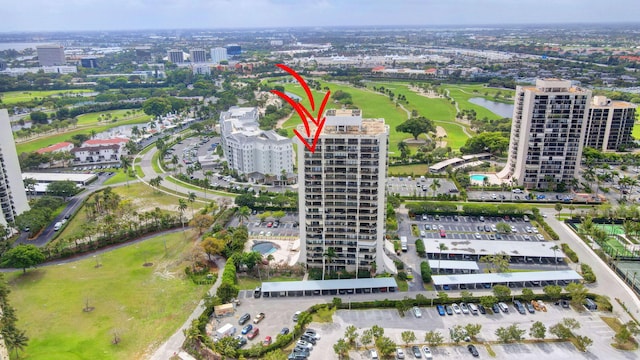 aerial view featuring a view of city and view of golf course