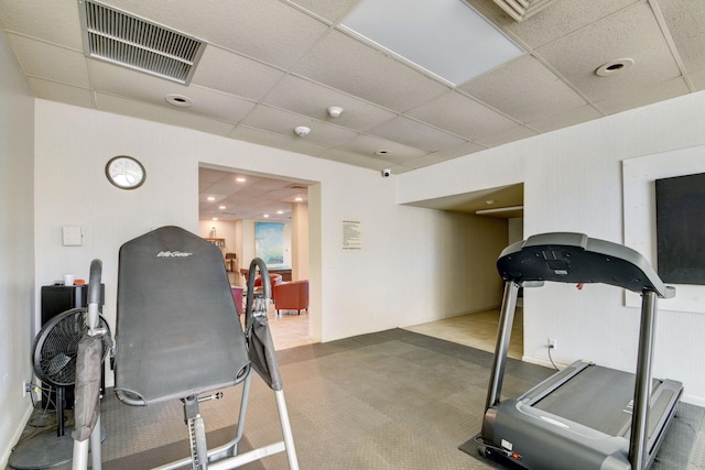 exercise area with visible vents and a drop ceiling