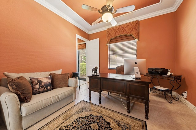 office space with crown molding, light tile patterned floors, baseboards, and ceiling fan