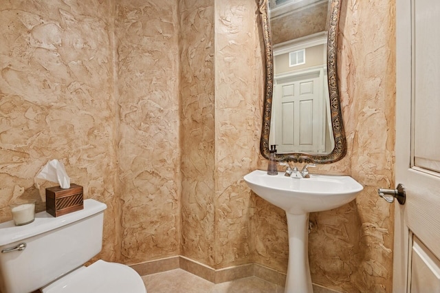 half bath with visible vents and toilet