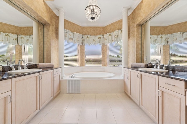 bathroom with a sink, visible vents, a bath, and tile patterned flooring