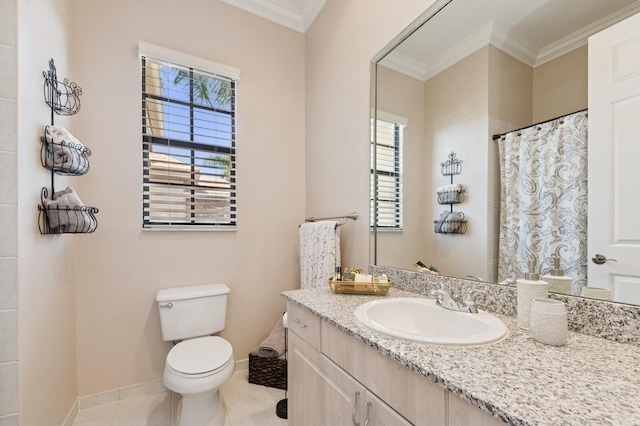 bathroom featuring tile patterned flooring, crown molding, baseboards, toilet, and vanity