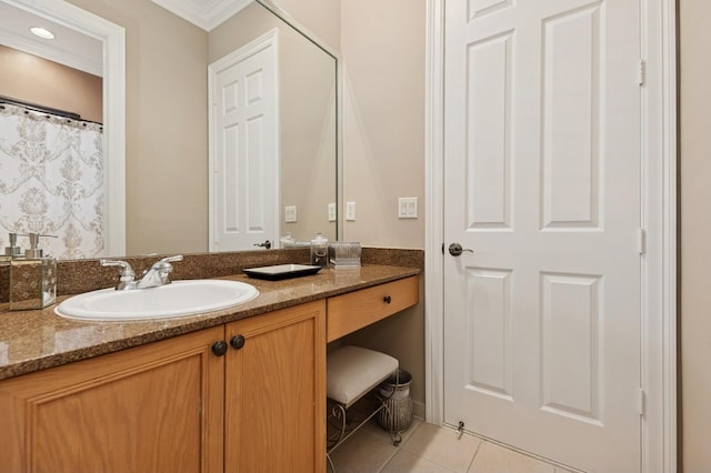 bathroom featuring tile patterned floors and vanity