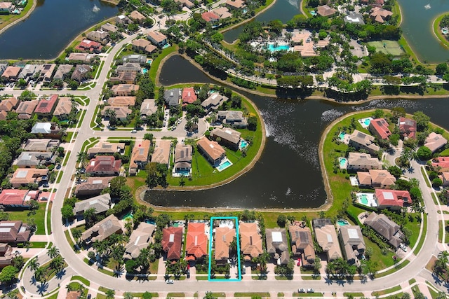 aerial view with a residential view and a water view