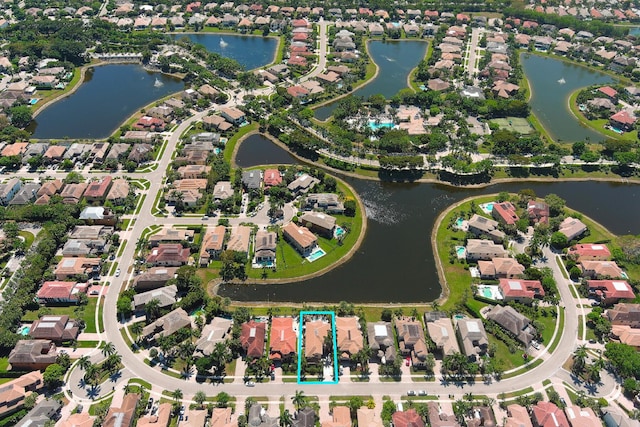 aerial view featuring a water view and a residential view