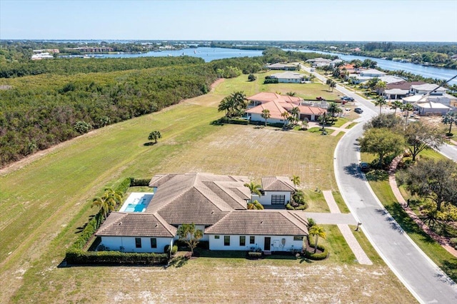 bird's eye view with a water view