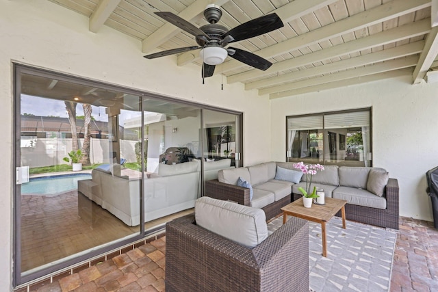 view of patio / terrace with ceiling fan, outdoor lounge area, and a fenced in pool