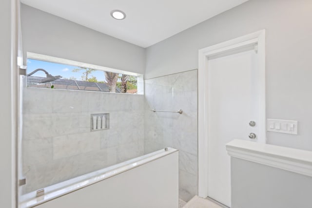 bathroom with a walk in shower